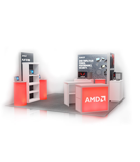 AMD event booth featuring banner, desks, and red light-up logo on the front. Title: AMD Triple Play: Power. Performance. Security.